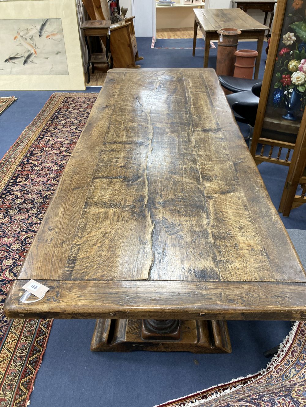 An oak refectory table on turned end supports, width 222cm depth 84cm height 77cm